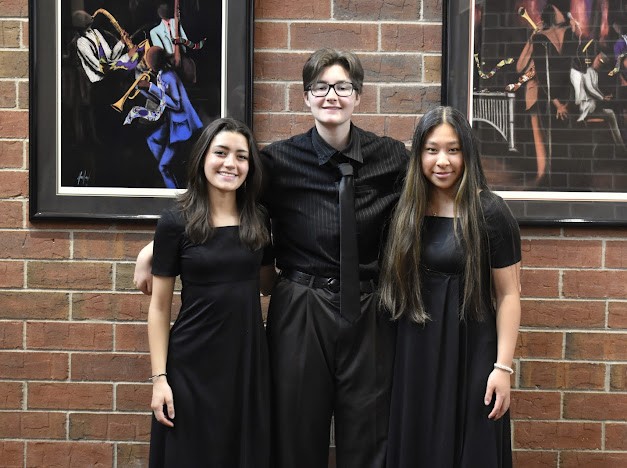 Cate Farrell, Claire Hu, and Ashley Sanchez celebrating their All State Honor Band selection